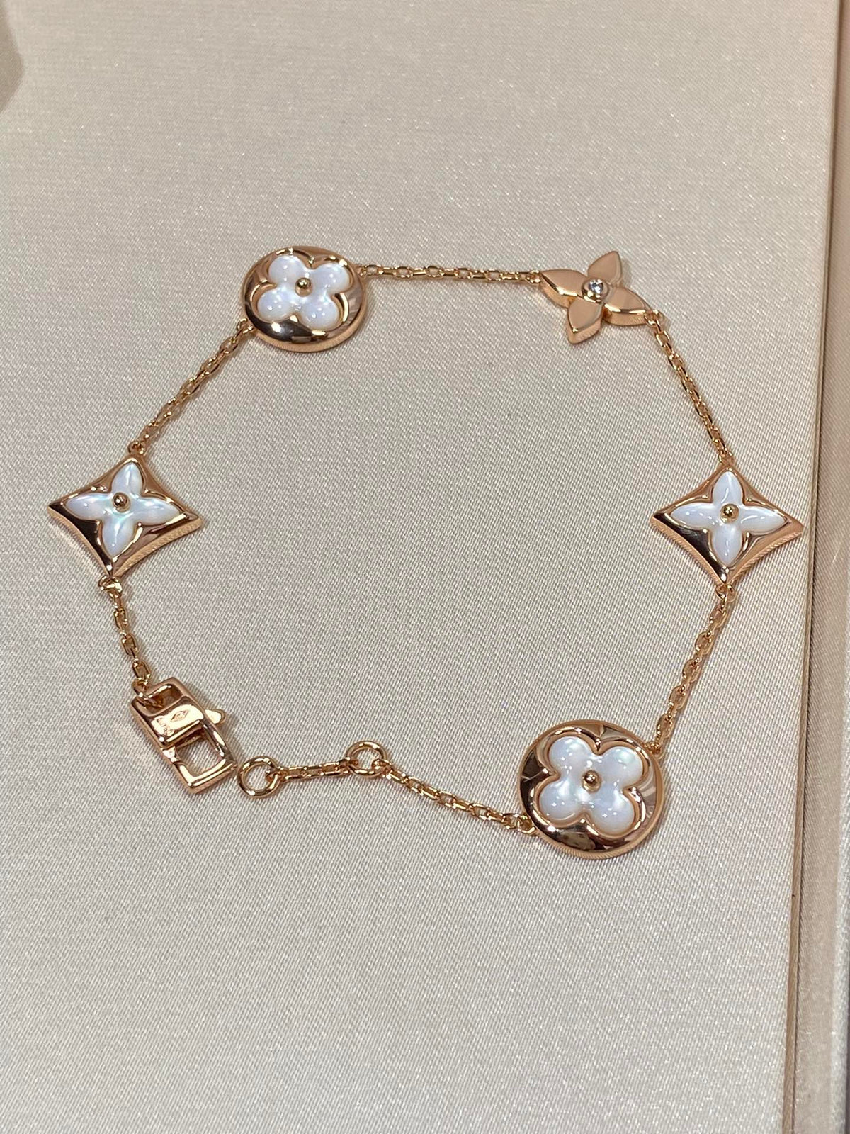 [Stellar Jewelry]STAR AND SUN 5 MOTIF MOP PINK GOLD BRACELET