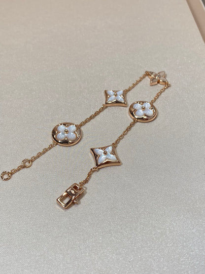 [Stellar Jewelry]STAR AND SUN 5 MOTIF MOP PINK GOLD BRACELET