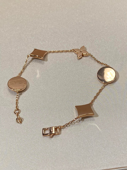 [Stellar Jewelry]STAR AND SUN 5 MOTIF MOP PINK GOLD BRACELET