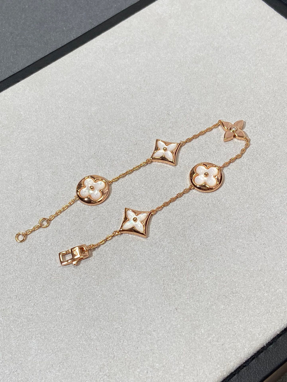 [Stellar Jewelry]STAR AND SUN 5 MOTIF MOP PINK GOLD BRACELET