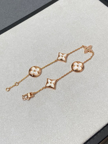 [Stellar Jewelry]STAR AND SUN 5 MOTIF MOP PINK GOLD BRACELET