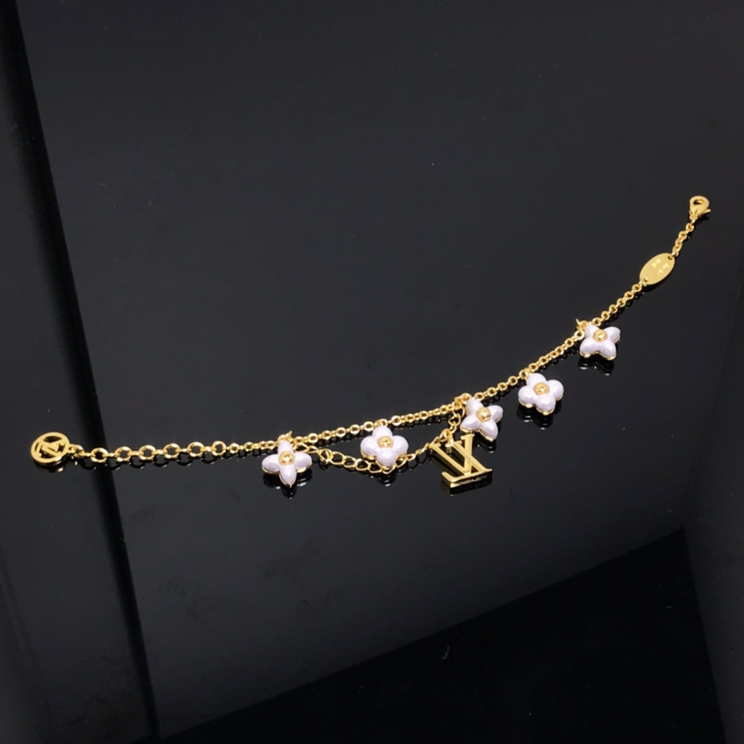 [Stellar Jewelry]LOGO 6 MOTIF STAR AND SUN GOLD BRACELET